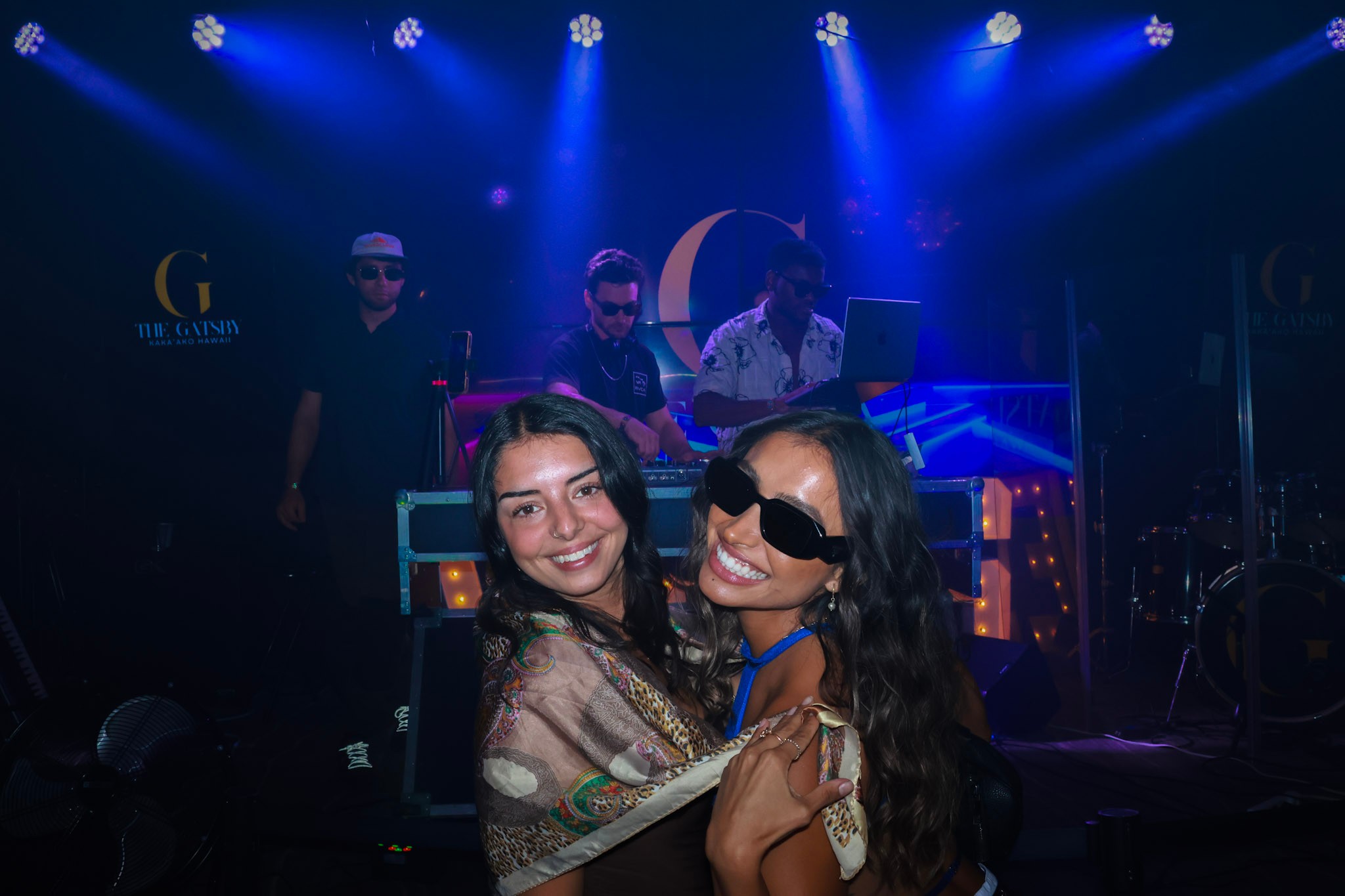 Two women at The Gatsby, blue stage lights