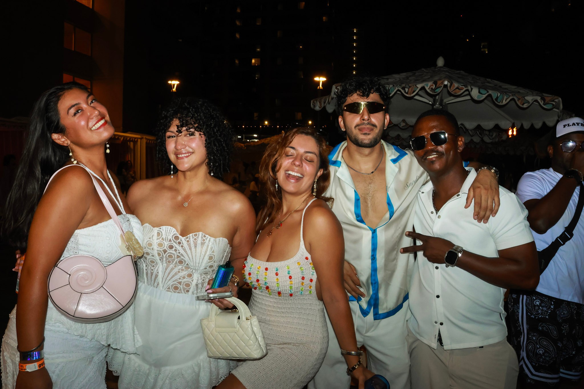 Group in white at night event
