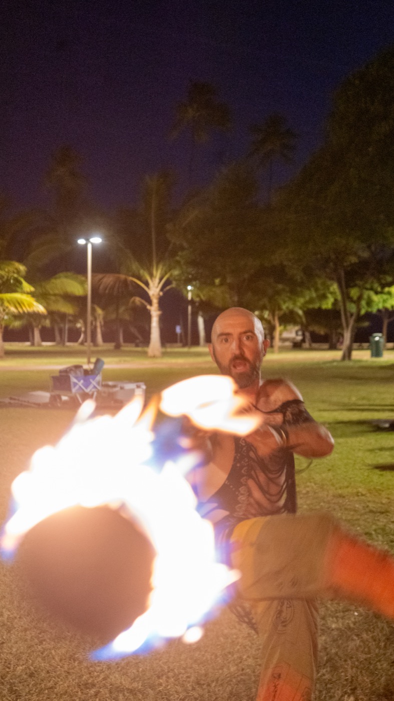 Fire dancer at night