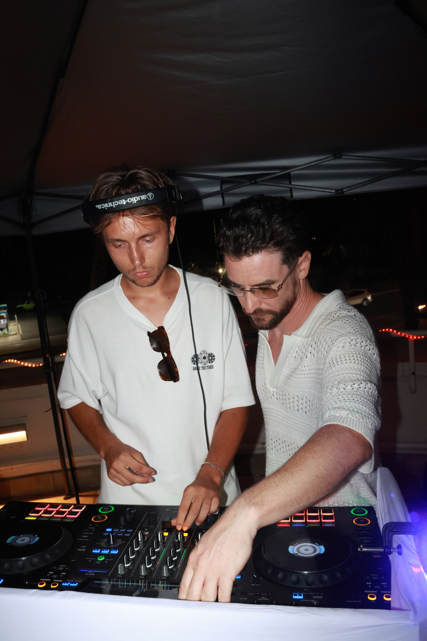 Two DJs at the booth